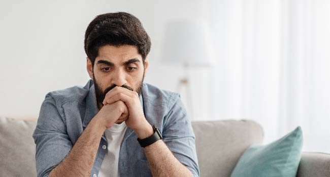 depressed-arab-man-having-problems-thinking-while-650x350